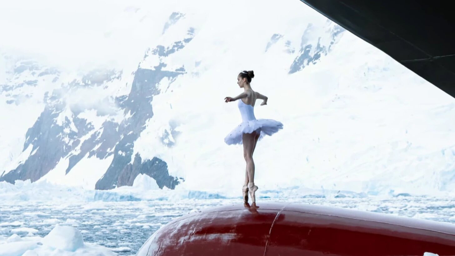 A ballerina, en pointe, on the deck of a Russian icebreaker amid Arctic ice